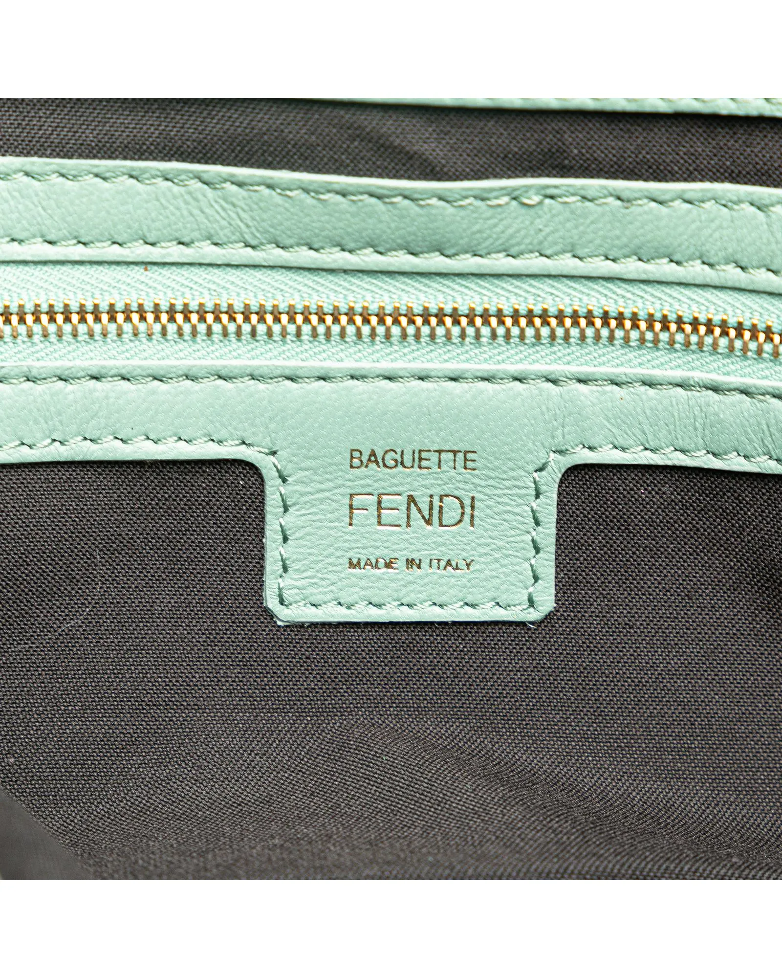 Zucca Embossed Leather Baguette Satchel with Detachable Strap and Interior Zip Pocket